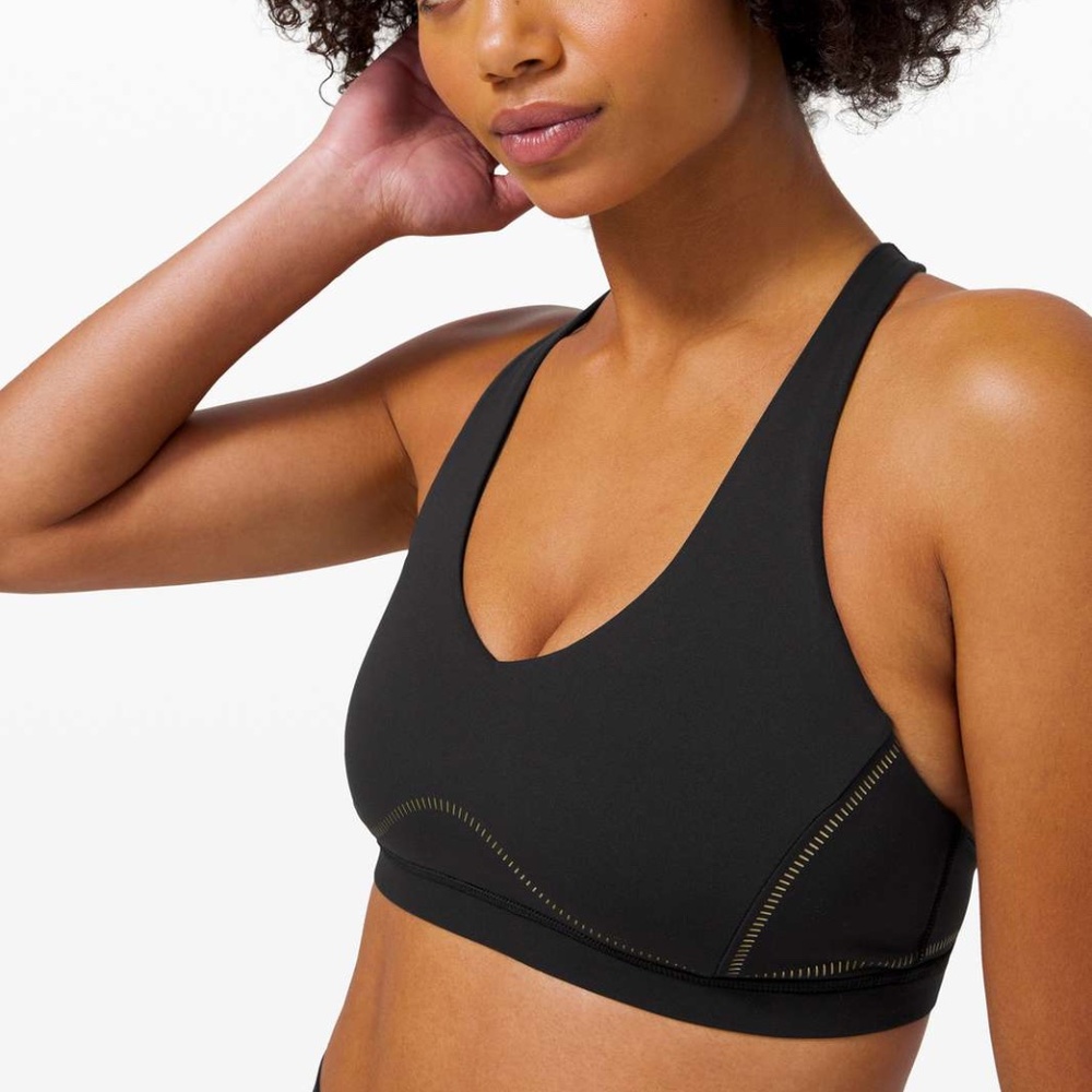 Lululemon black and gold Arise Bra size 4